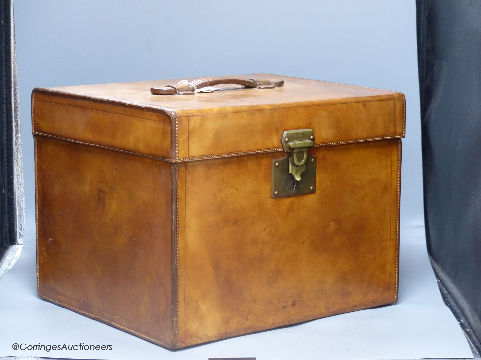 A brown hide travelling case